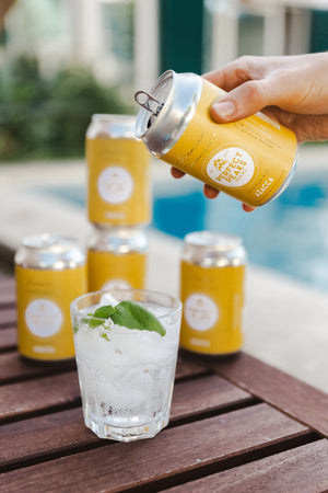 Pouring poolside hop water cocktail